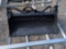 Wolverine Mini Skid Steer Combination Bucket Attachment