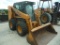 Case 440 skidsteer, full cab, need hydro wheel drive motor work, 72