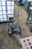 SWISHER WHEEL STRING MOWER