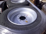 (1) DIAMOND BACK 215-75R17.50 TIRES ON 8-HOLE RIM