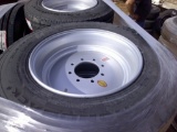 (1) DIAMOND BACK 215-75R17.50 TIRES ON 8-HOLE RIM
