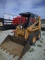 CASE 1840 SKID STEER- NEW TIRES