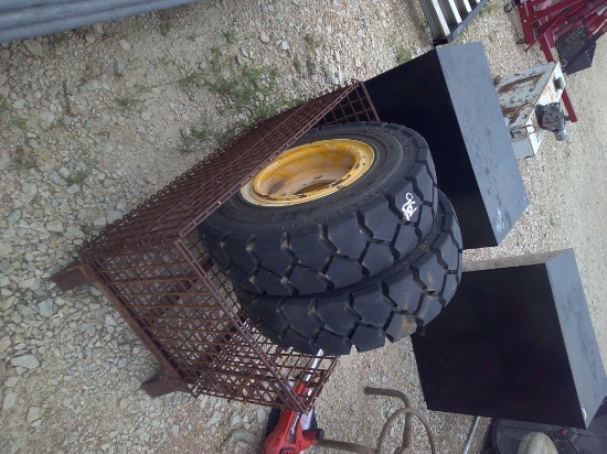 (2) SOLID 7:00x12 SKID STEER TIRES IN BASKET