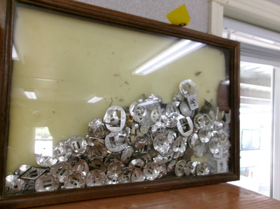 DISPLAY CASE W/ CONCHOS