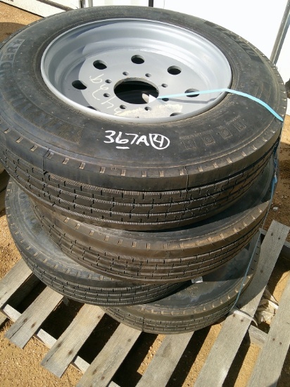 TRAIL FINDER 215-75R17.5 TIRES W/ 8-HOLE WHEELS