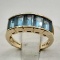 14k Gold Ring with Channel Set Blue Topaz