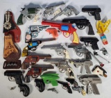 Case lot full of Vintage Cap Guns and Water Pistols