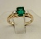 10K Yellow Gold Ring with Synthetic Emerald & 2 Side Diamonds