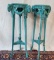 2 Turquoise Hand Carved and Painted Wood Three Legged Pedestals with Rams Heads and Garland