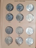 Dansco Album of Peace Dollars Complete Except for 1928 (23 coins)