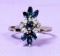 14k White Gold Diamond & Blue Topaz Ring