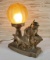 Spelter Hunter And Bird Dog Figural Table Lamp With Crackle Glass Amber Shade