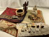 Lot Of Linens, Door Hardware, Stone Art Buddha Statue And Miniature Religious Amulets