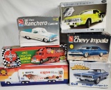 4 Model Car Kits & 2 Advertising Trucks