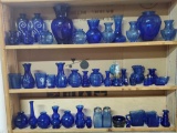 3 Shelves full of Cobalt Glass Vases, Pitchers, Bowls and More