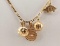 14K Yellow Gold Figaro Chain With 4 Sports Related Charm Pendants