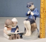 Royal Copenhagen Boy Carving Stick 905 and Bing & Gr...ndhal Children Reading 1567 Porcelain Figurin
