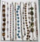 Collection of 12 Sterling Silver Bracelets with Gemstones, Shells, & More