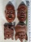 4 Malaysian Carved Wood Masks with Bone Inset Eyes and Teeth