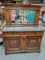 Antique Sideboard with Carved Animal Decor, Marble Top, & Mirror Back