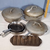 Favorite Piqua Ware Cast Iron with Nickel finish cookware skillets and Dutch Oven