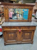 Antique Sideboard with Carved Animal Decor, Marble Top, & Mirror Back