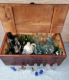 Collection of Old Bottles in Vintage Wood Crate