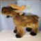 Whimsical Baby Moose on all Fours Sit On Stuffed Animal