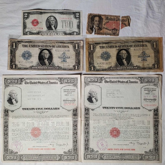 2 $25 WWII War Bonds, 2 Large Format $1Silver Certificates, Early $2 bill and as is 50c fractional