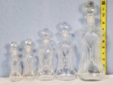 5 Graduated Sizes of Clear Scandinavian Design Pinch Bottle Kluk Kluk Decanters made famous by