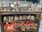 3 Shelves of Christmas Village Lighted Houses & Accessories