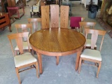 Round Oak Dining Table With 3 Leaves and 4 Chairs