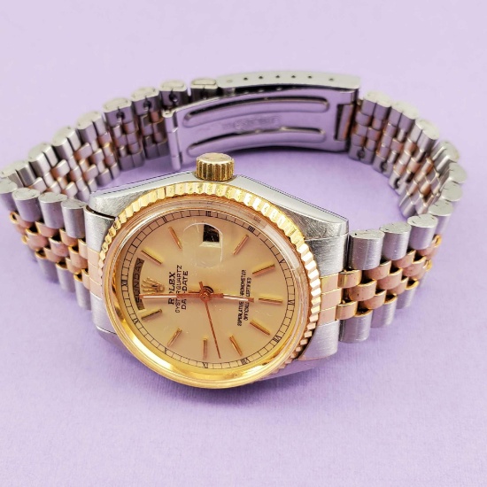 Used Replica Rolex Oyster Quartz Day-Date Gold Face Stainless Steel And Gold Tone Wrist Watch
