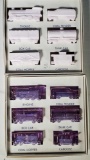2 Boyd Limited Run Glass Train Sets in Alexandrite and Pink