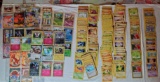 Collection of Pokemon Cards Including Rares and Promos plus Bulk Fossil and Jungle Cards and Book