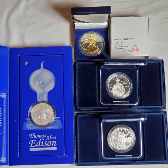 4 Comemmorative and Silver Bullion Dollars in Presentation Cases