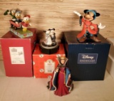 4 Disney Figurines