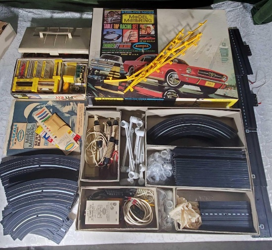 Incredible lot of 1960s Aurora Slot Cars Race Set, Slot Car Chassis and Bodies with Boxes