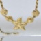 14K Yellow Gold Starfish And Shell With Rope Chain Necklace Signed AD