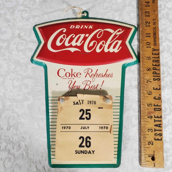 1970 Coca-Cola Fishtail Tin Litho Back Wall Hung Calendar Holder