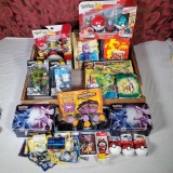 Tray Lot of Pokemon Figurines, Toys, Lunch Boxes, Booklets and Cards