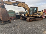 Caterpillar 325BL with MSD shear attached,