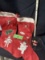 two 1960s Christmas stockings, one modern stocking, one cookies for santa plate