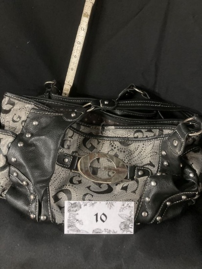 G purse, worn in a couple of places