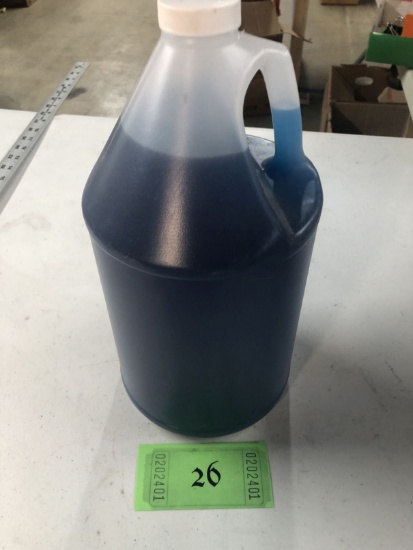 bottle of blue fluid. Probably dish soap