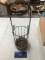 Wrought Iron and basket woven holder, wine bottle?