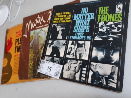 three vinyl records, the t-bones, marty robbins, hank locklin