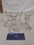 four glass short candle holders