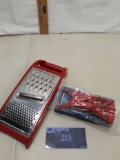 Red grater and red peeler