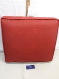 Red cushion, outdoor fabric